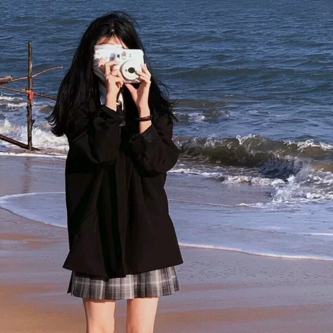 女孩与相机可爱微信头像